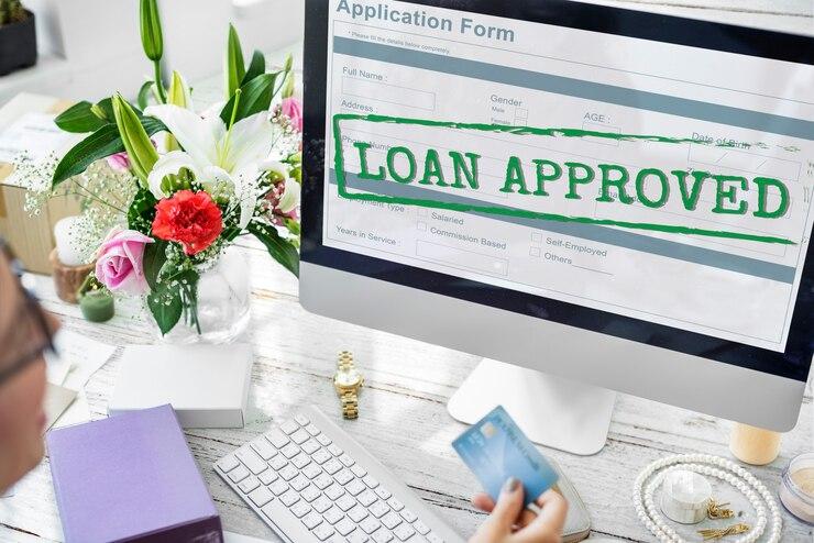 Close-up of an approved loan application form with a