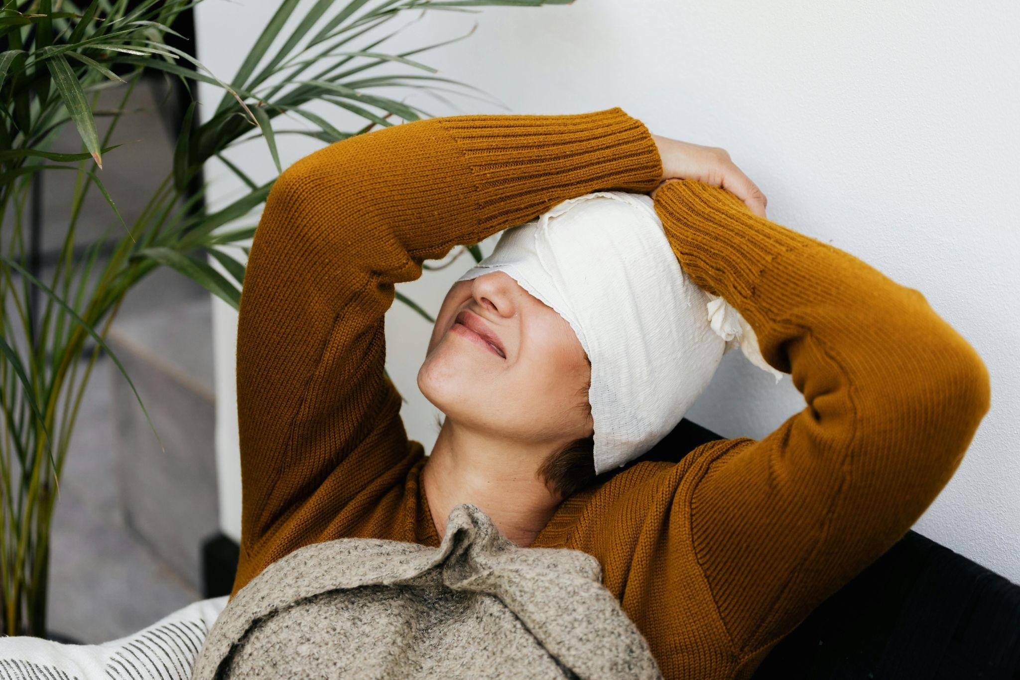 A person recovering from surgery at home