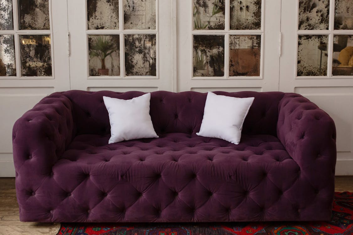 A jewel-toned sofa