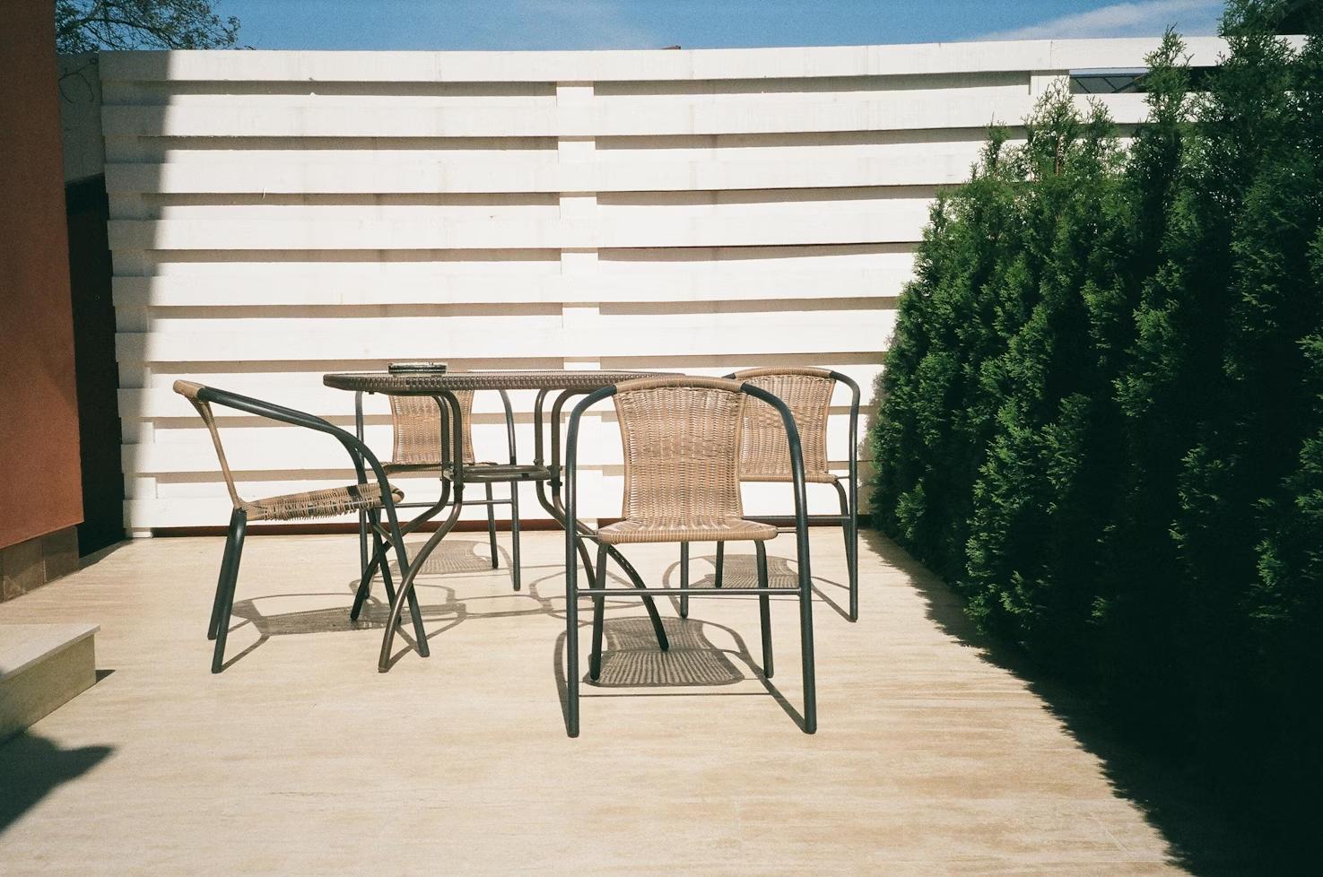 A wood fence around a patio
