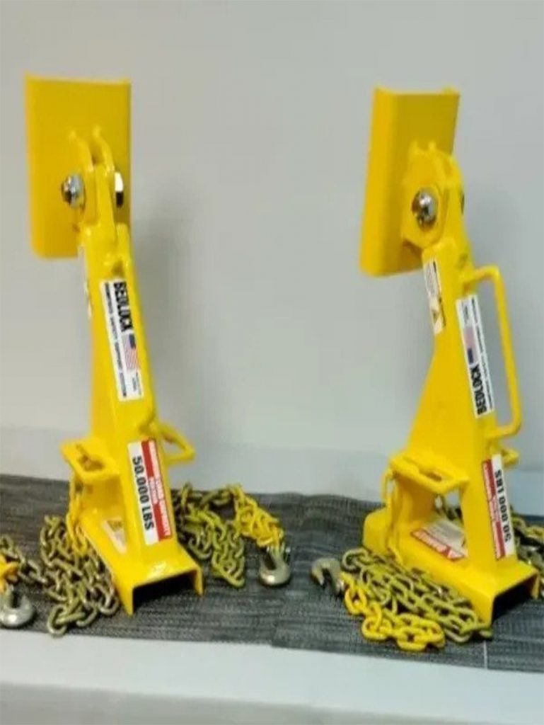 A close-up of durable truck bed locks designed for safety.