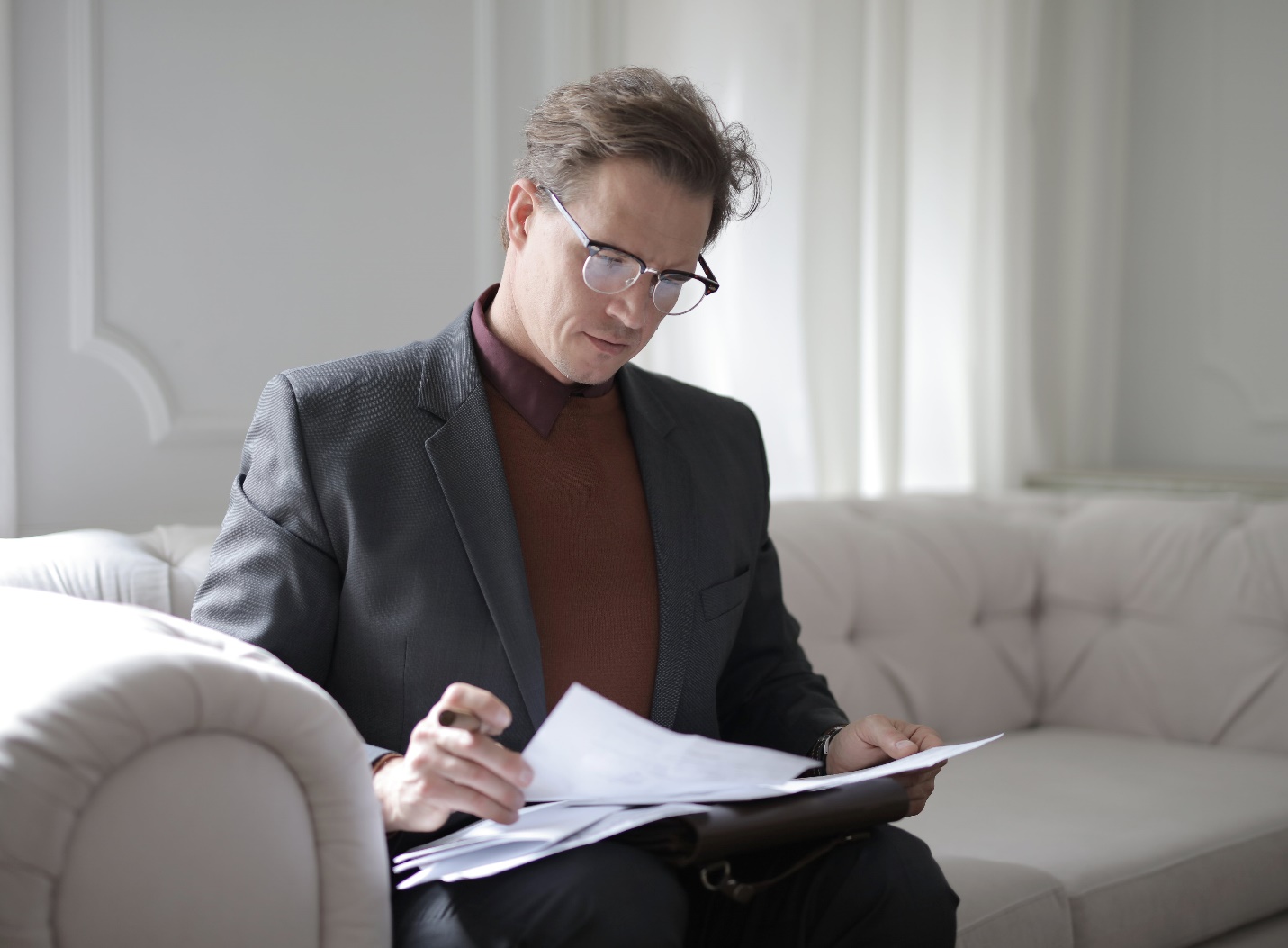 Private money lender looking at paperwork