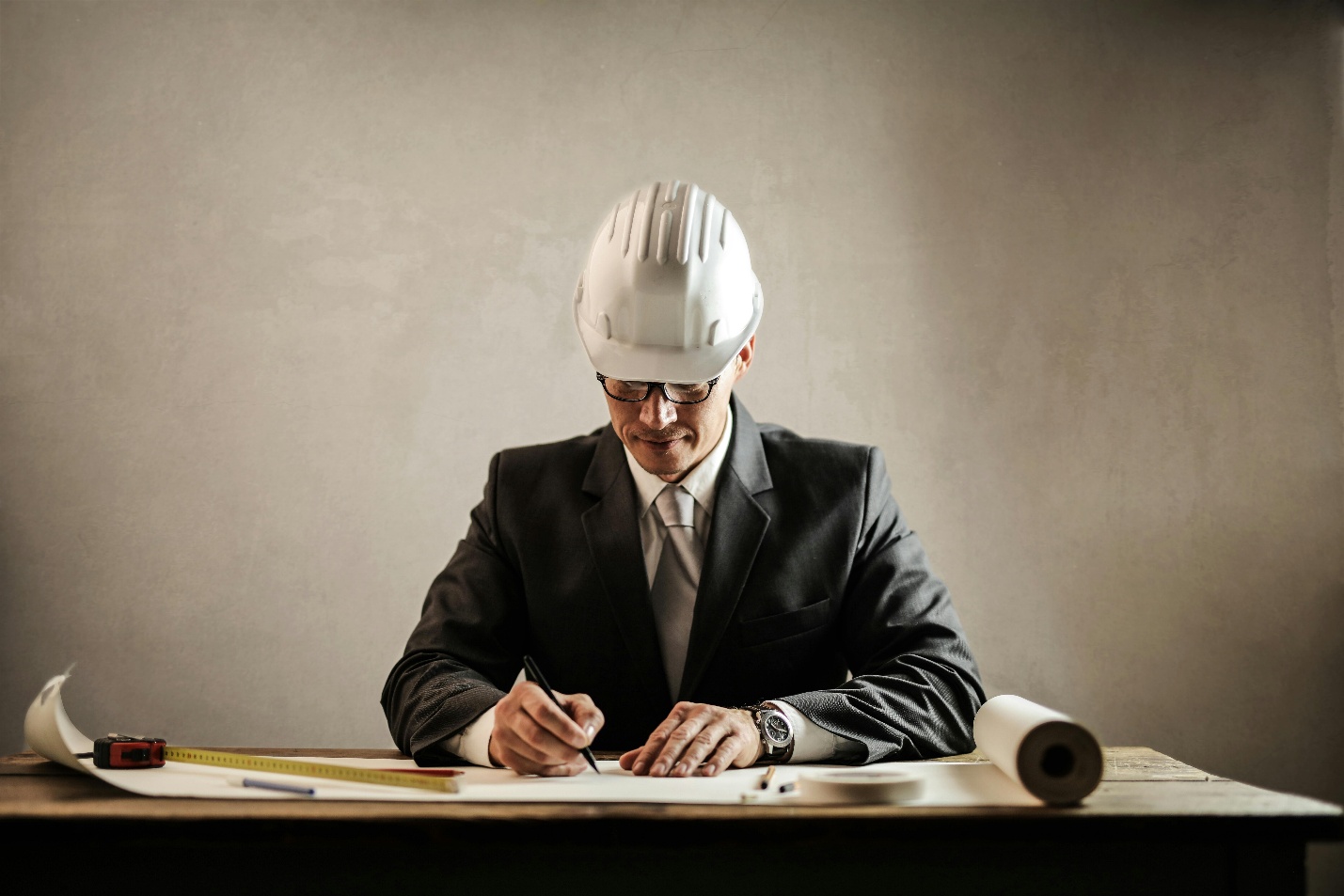 Contractor looking at paperwork
