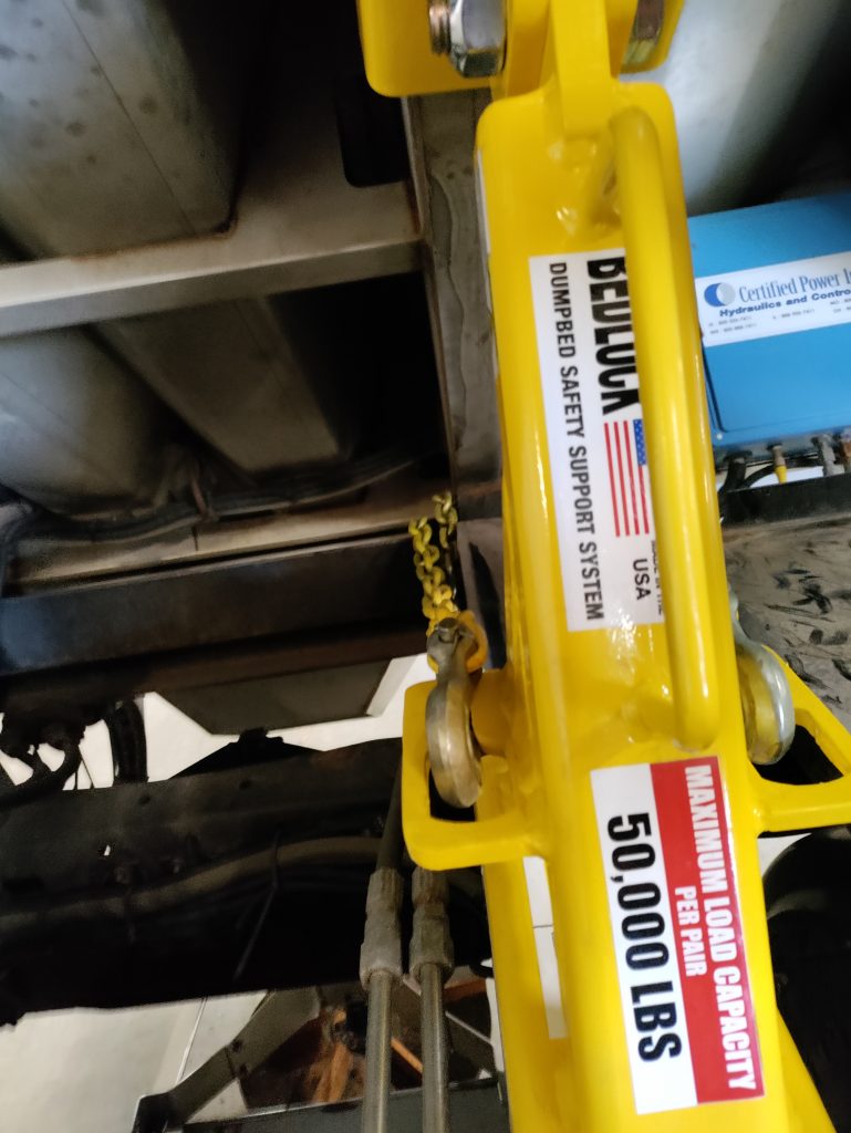 Close-up view of BedLock truck bed lock rated for 50,000-pound load capacity