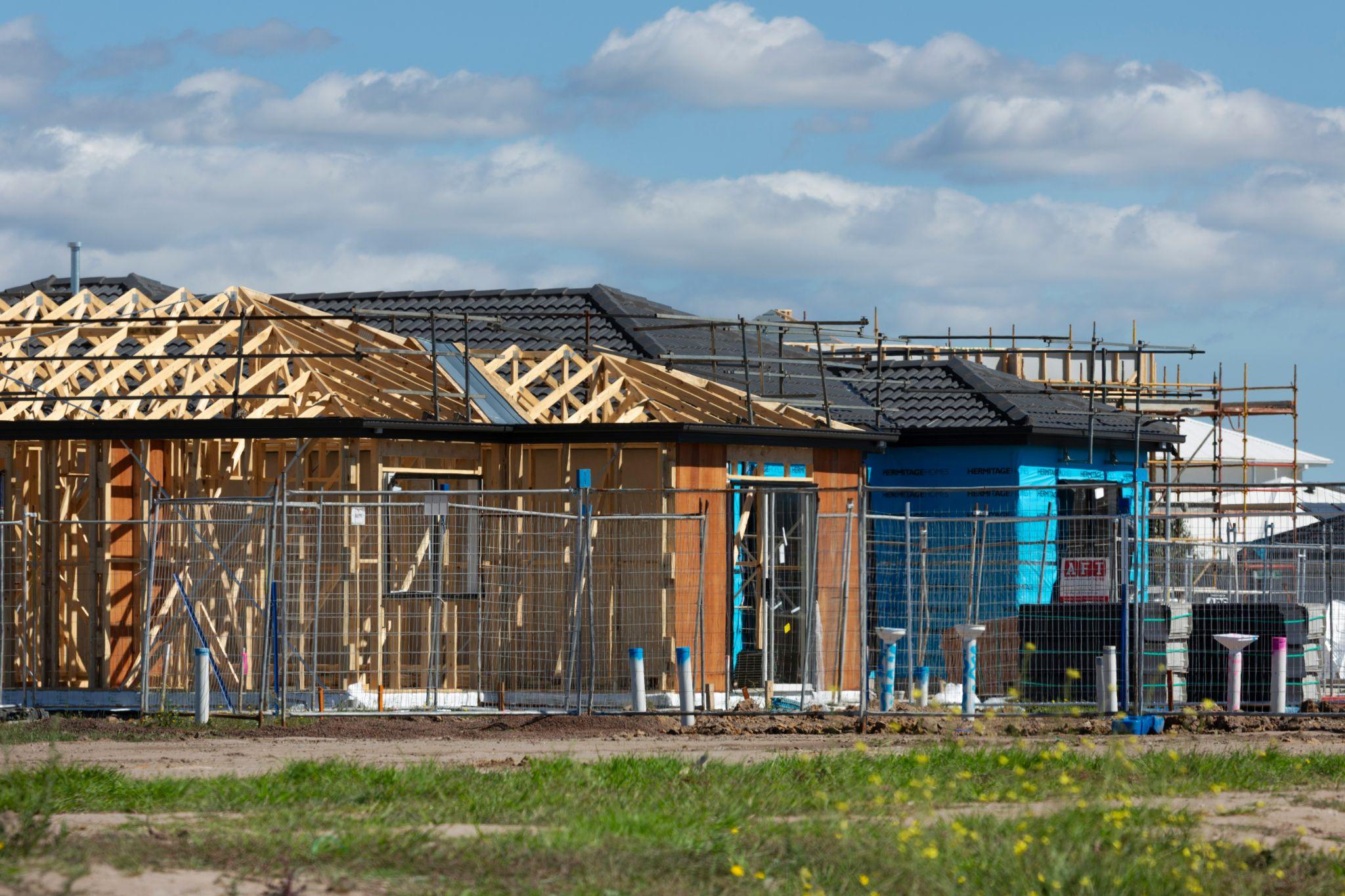 multiple construction projects under completion next to each other