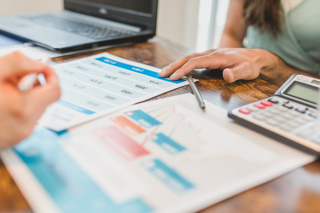 Real estate investor reviewing financial projections and property data