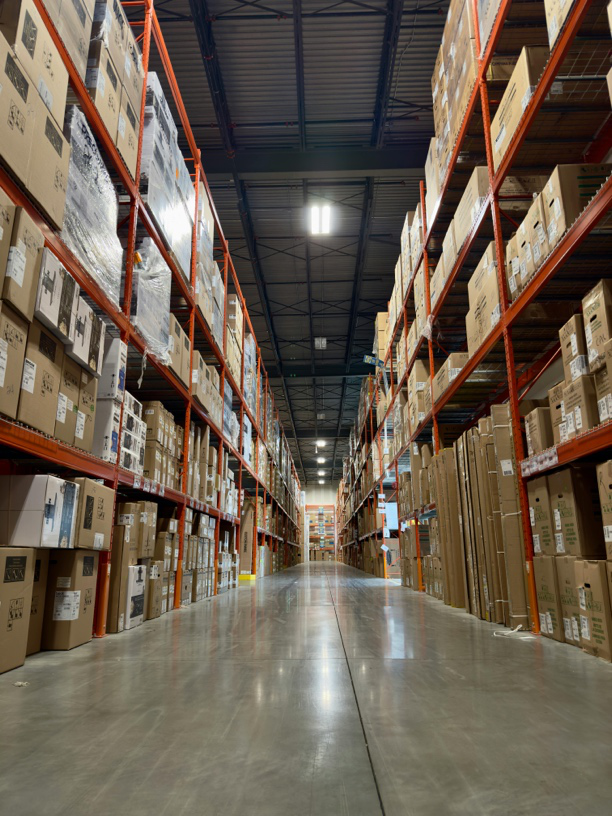 Warehouse floor maintained by an industrial cleaning team